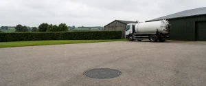 Clean rural commercial driveway prepared for sludge removal